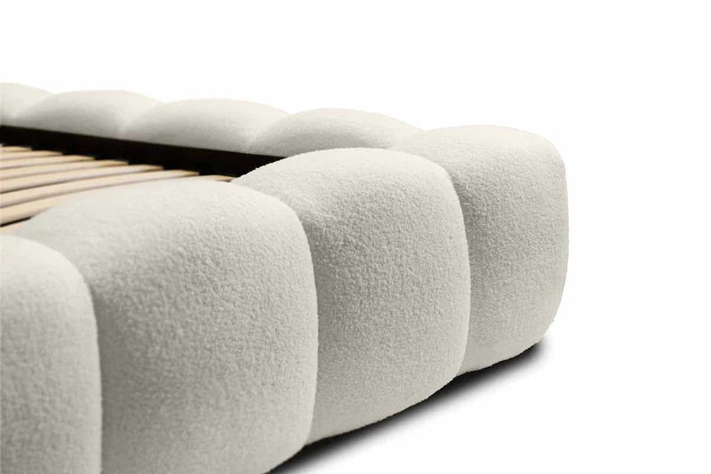 Gemütliches Polsterbett Teddy Bouclé – mit Stauraum